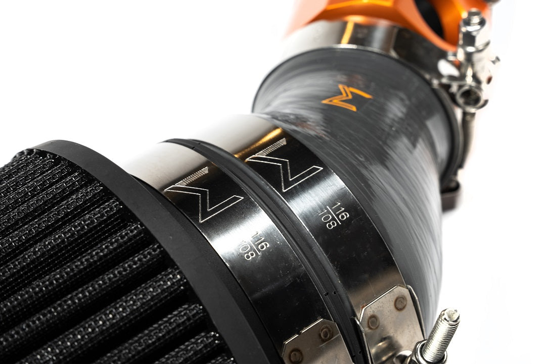 Engine bay detail showing upgraded intake secured with hardware