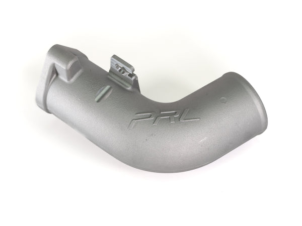 Aftermarket intake charge piping installed to support increased boost and throttle response