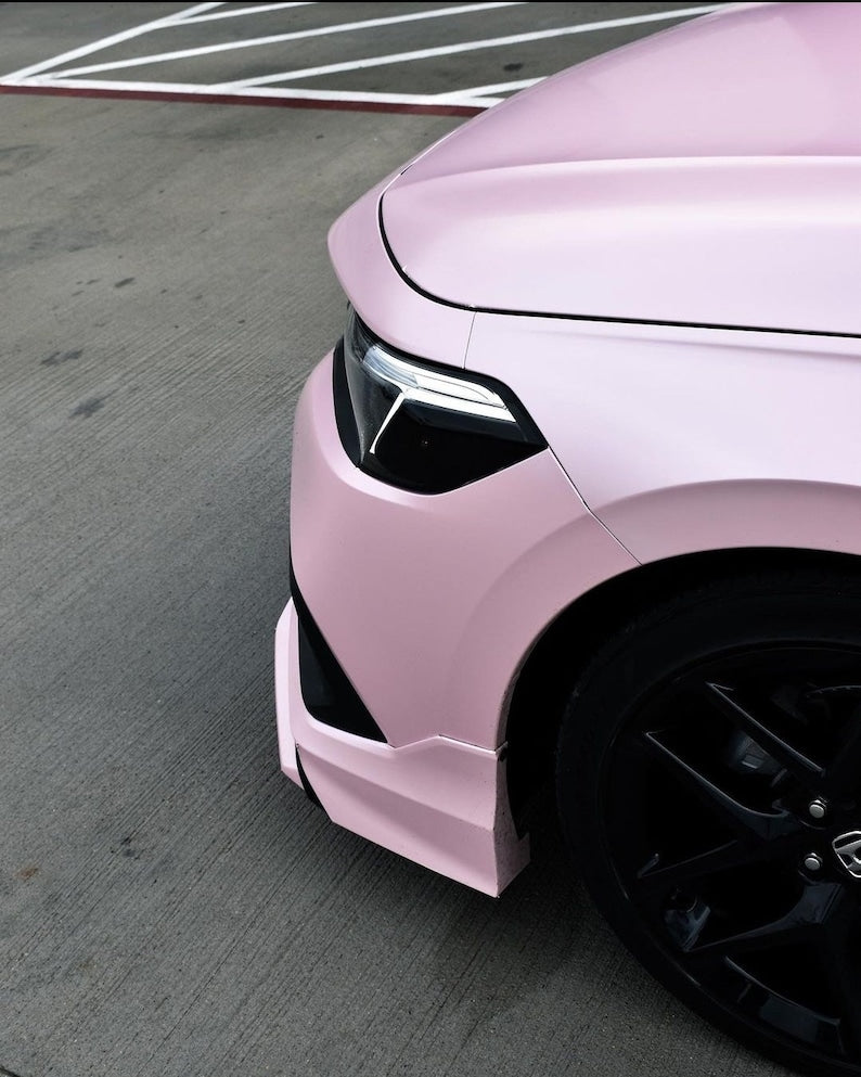 A close-up image of a pink Honda Civic side marker light with a tint overlay.