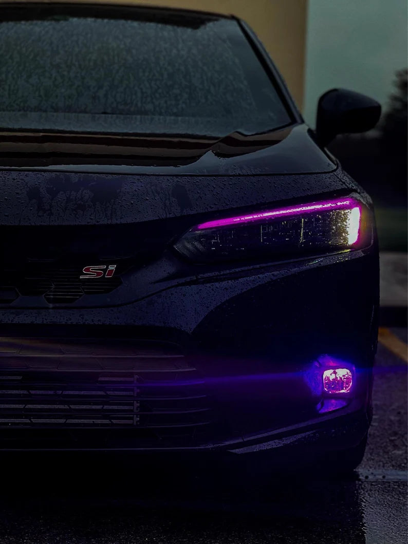 Honda Civic with purple DRL Headlight Tint ln a dark background