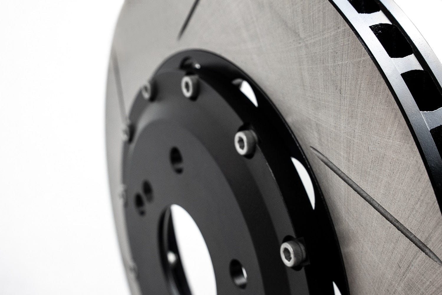 Close up of rotor slots and zinc coated hats