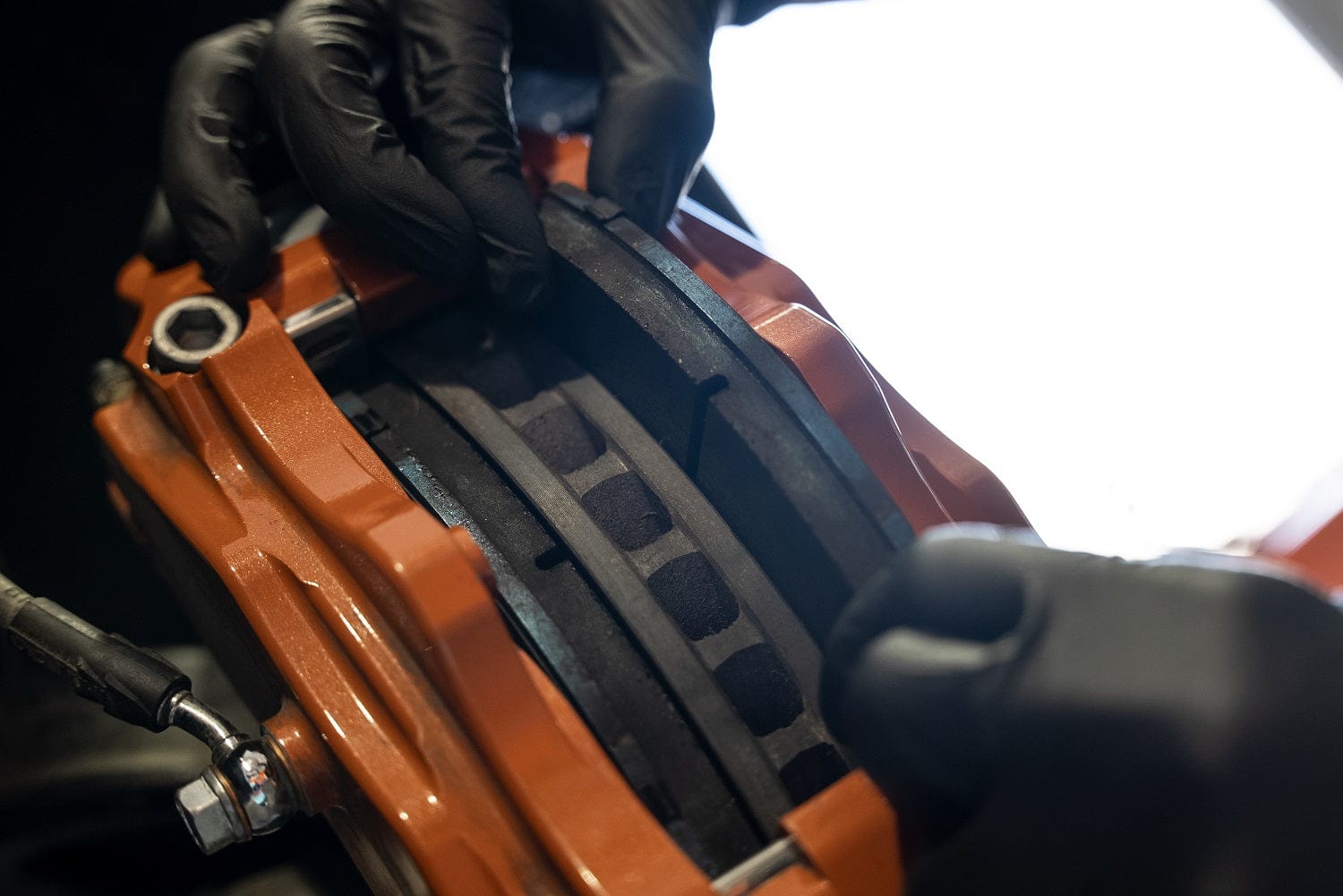 Orange caliper variant staged for installation