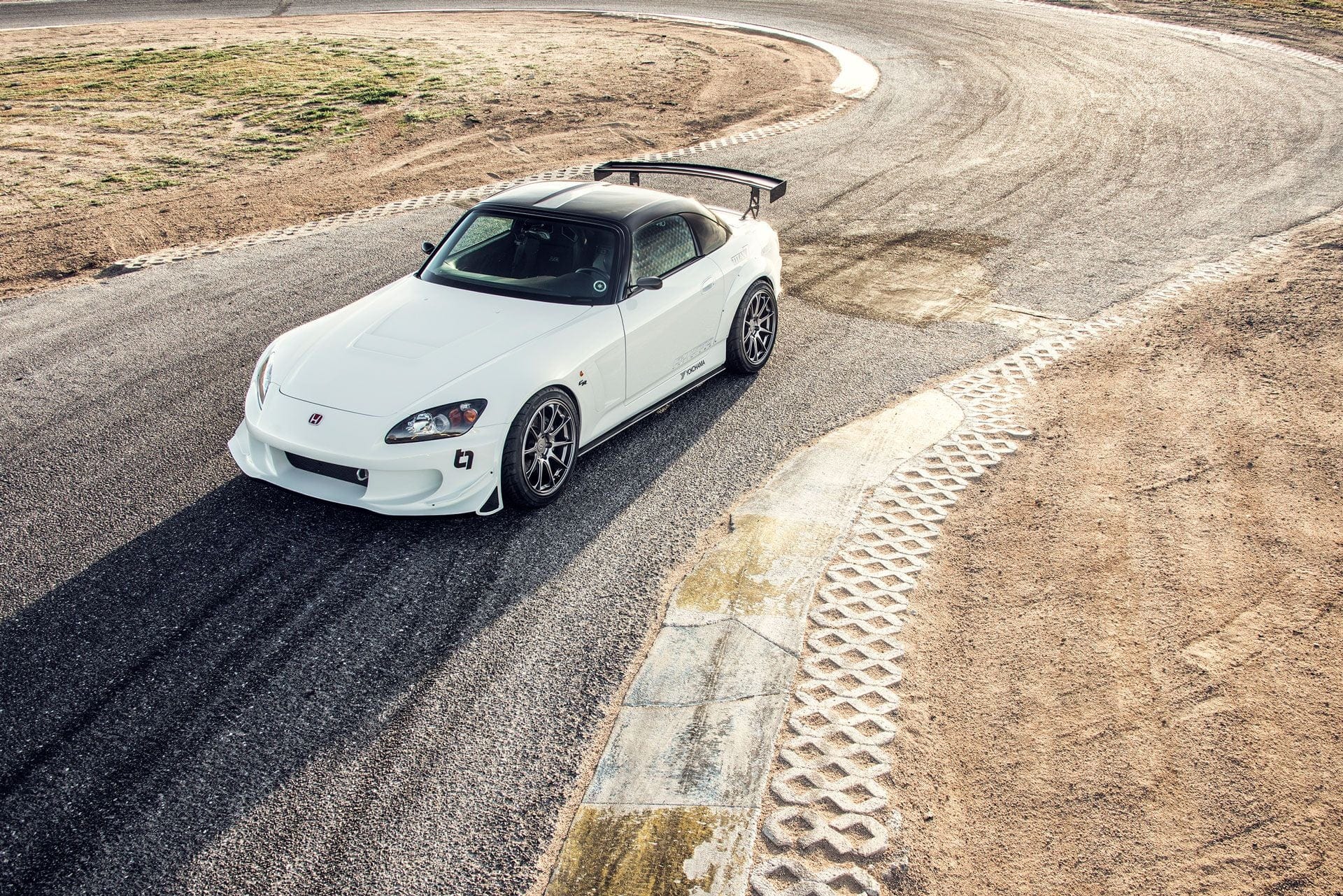 Product photo showing a Honda Civic in a race track