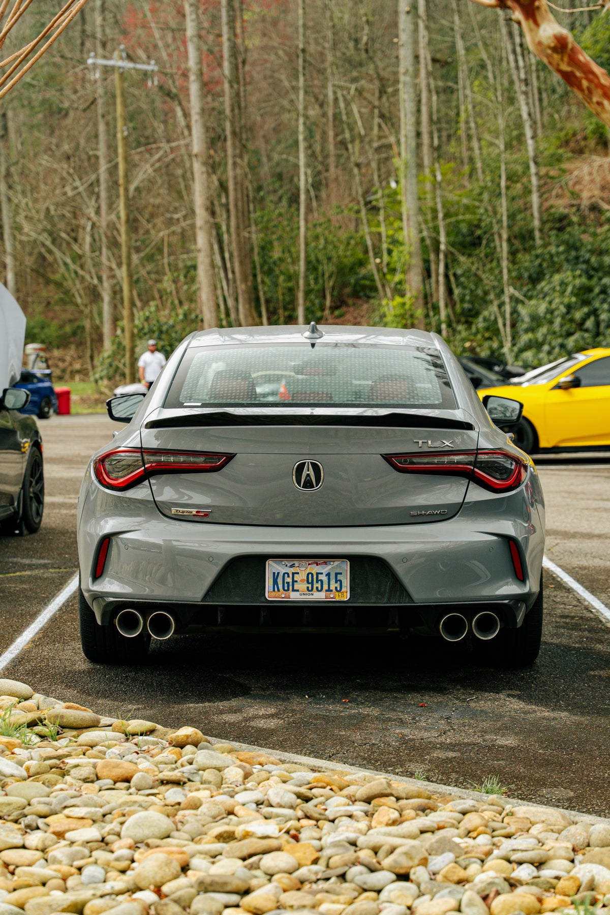 An Acura TLX Type-S seen from the rear at a car meet