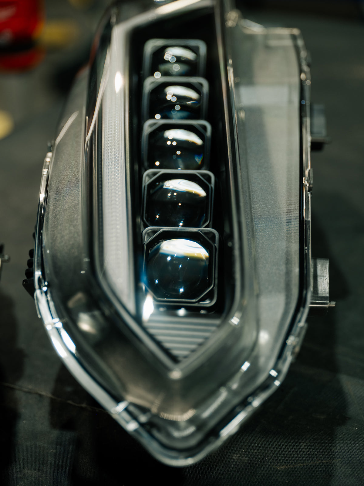 Close-up of the five-element LED projector cluster inside a TSP Senko Series headlight