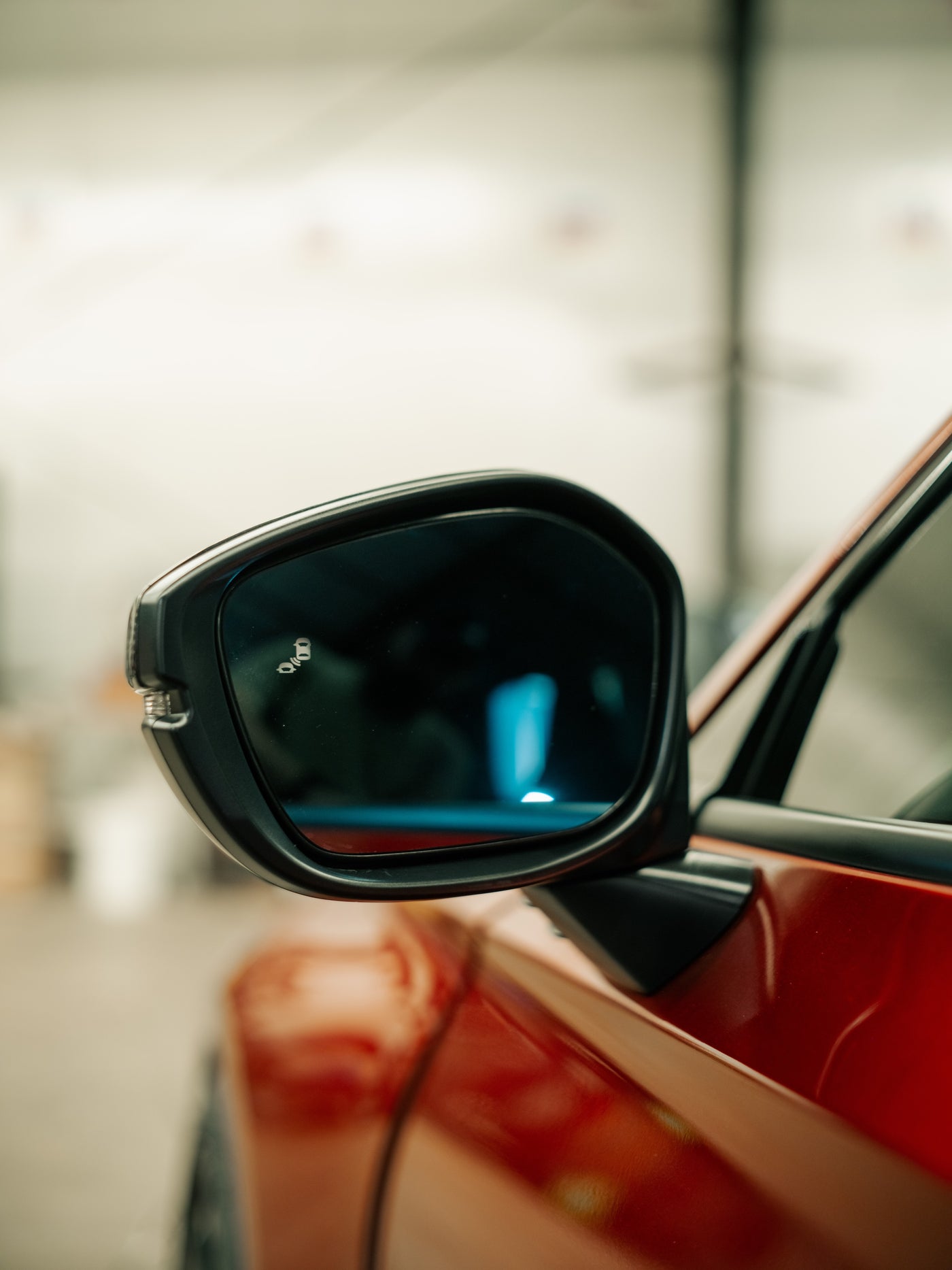 TSP blue anti-glare side mirror glass fitted to a Honda, seen from the side of the car