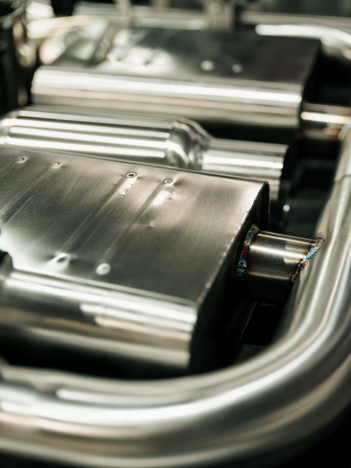 TIG welded joint where the pipe meets the muffler body on the TSP Hibiki 304 stainless exhaust