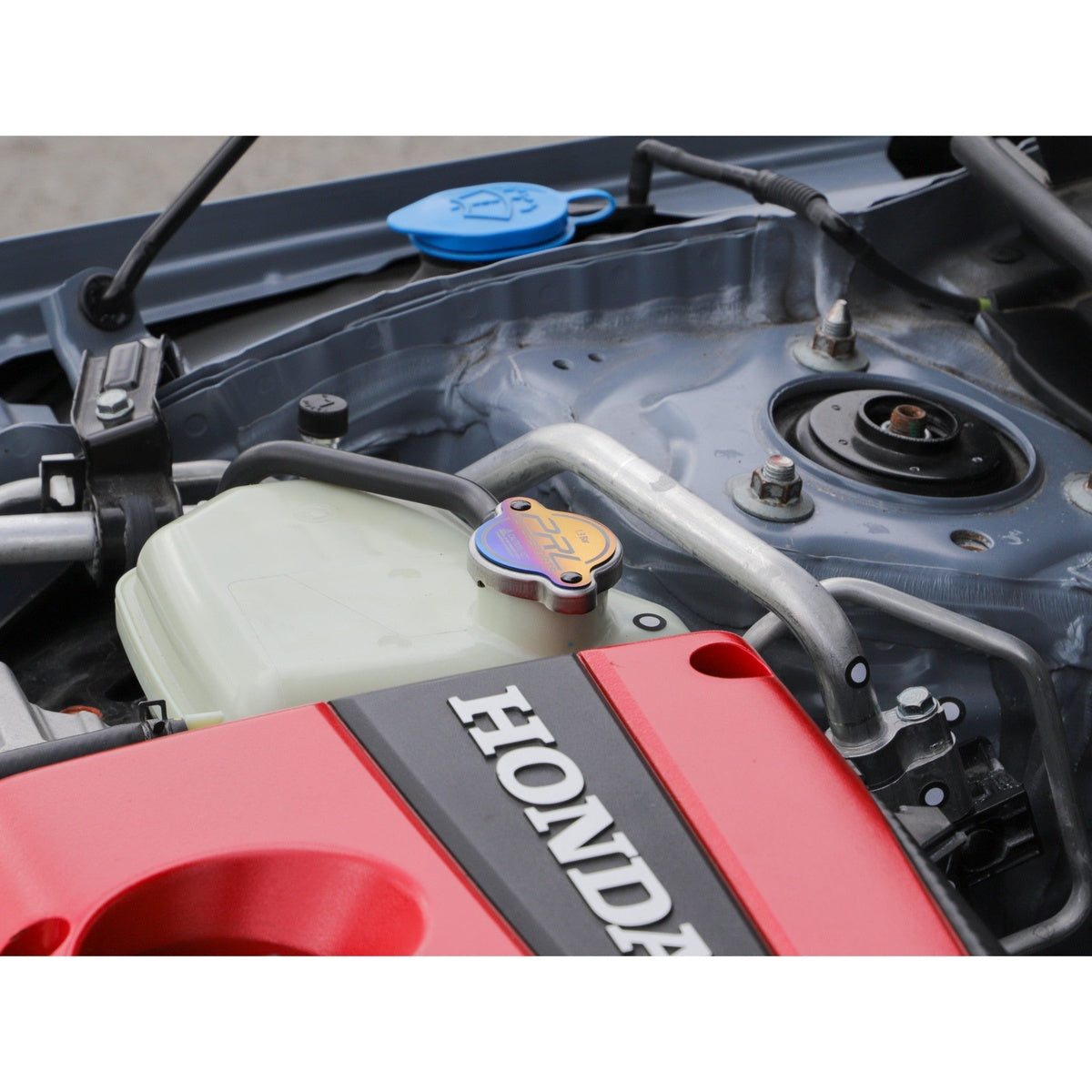 Driver-side engine bay angle showing PRL radiator cap